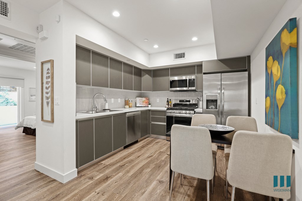 Kitchen with Stainless Steel Appliances and Ample Cabinet Storage