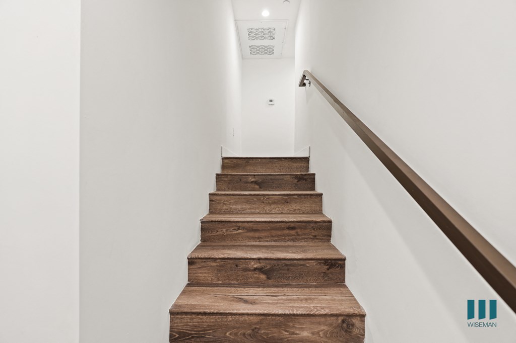 Stairway Leading to Upper Level of Unit