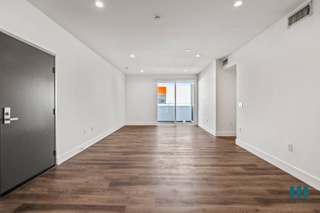 Living Room with Patio, Recessed Lighting, and Vinyl Flooring