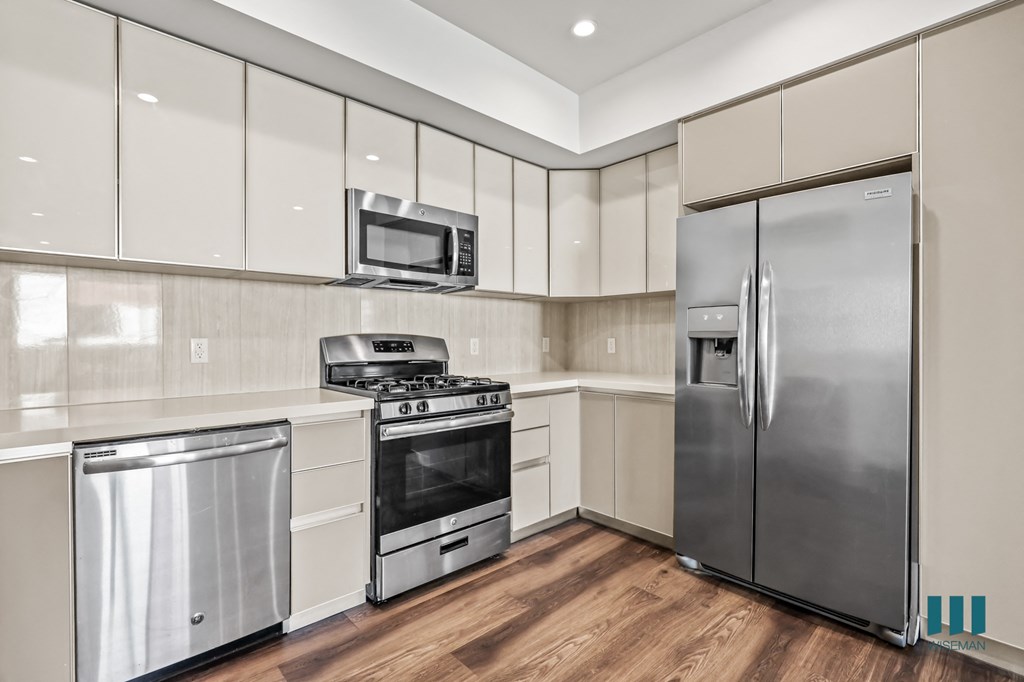 Kitchen with Energy-Efficient Appliances and Ample Cabinet Storage