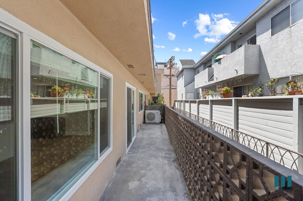 Upper-Level Hallway of Alfred Atlas by Wiseman