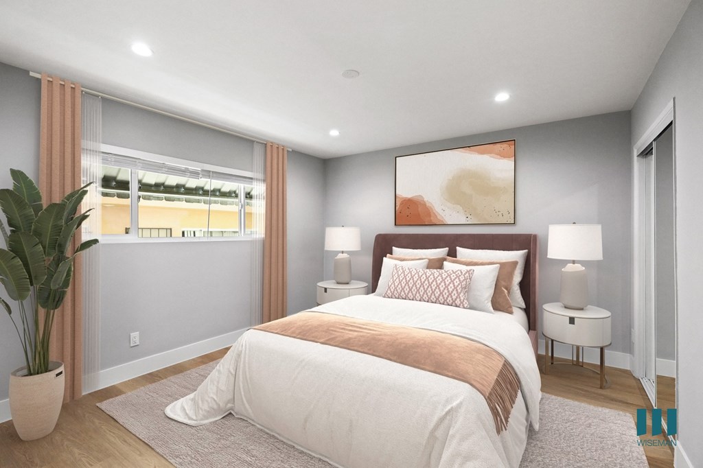 Bedroom with Mirrored Closet, Vinyl Flooring, and Recessed Lighting