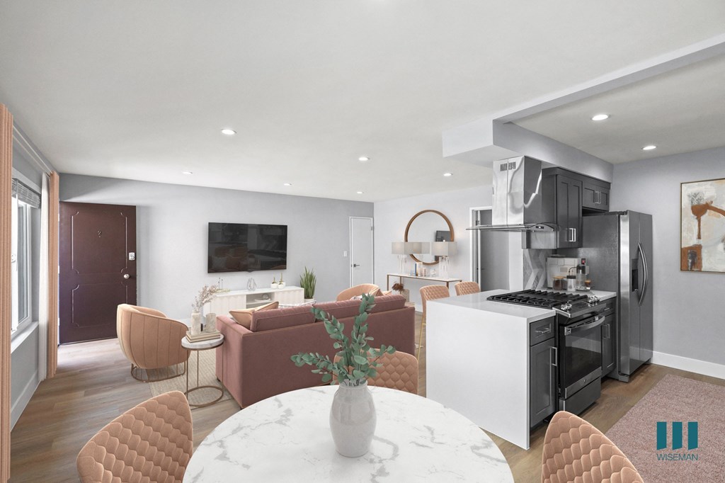 Open-Concept Kitchen with Countertop Bar and Dining Area