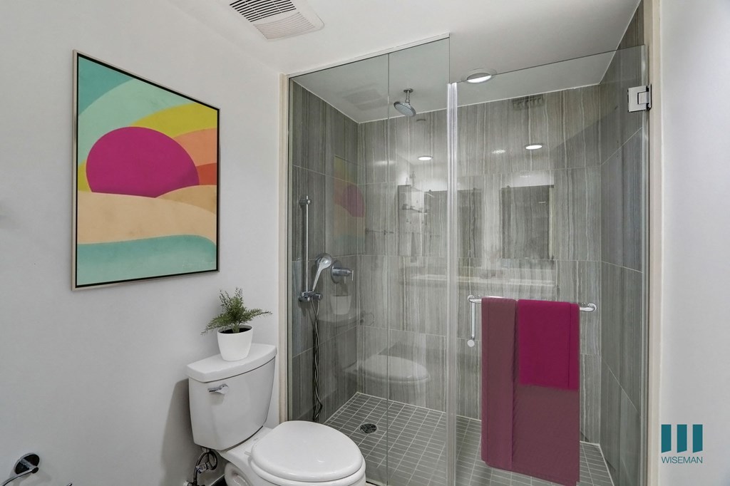 Bathroom with Large-Size Walk-In Shower with Glass Doors
