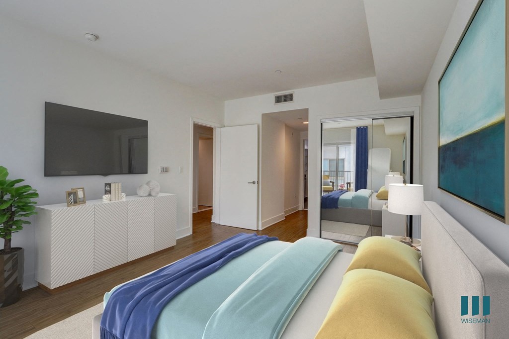 Large-Size Bedroom with Mirrored Closet, Bathroom, and Vinyl Flooring Large-Size Bedroom with Mirrored Closet, Bathroom, and Vinyl Flooring