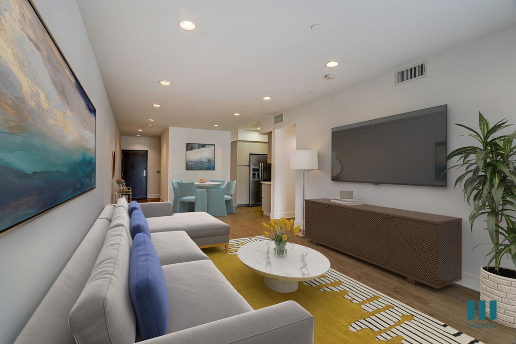 Open-Concept Dining and Living Room with Recessed Lighting and Vinyl Flooring