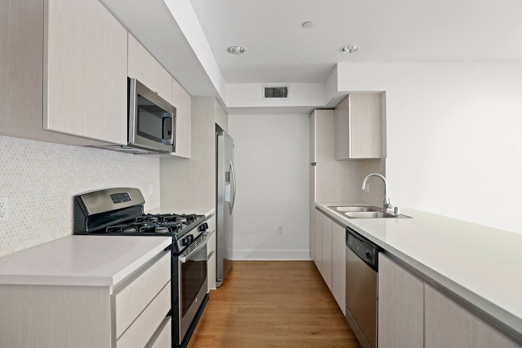 Kitchen with Stainless Steel Appliances and Ample Cabinet Storage