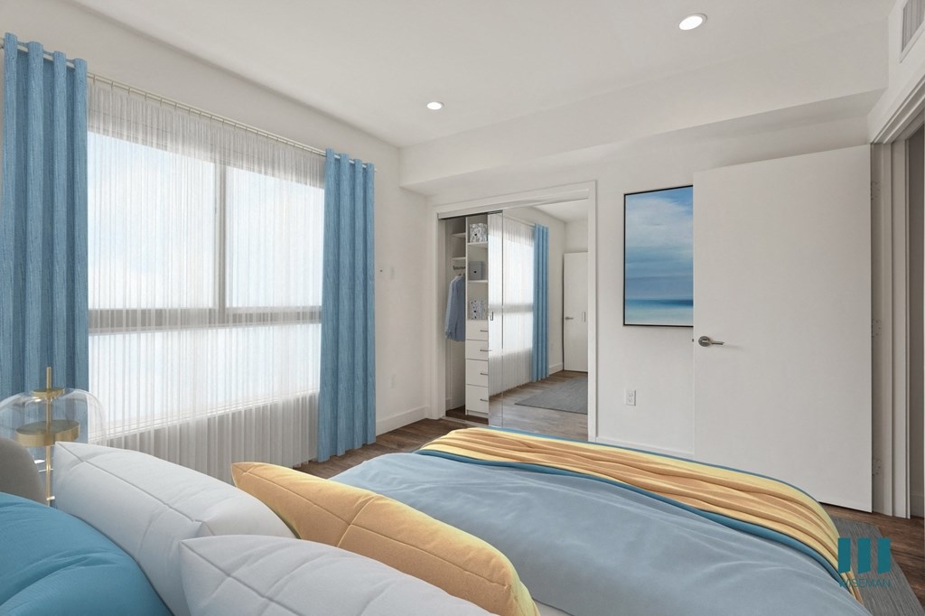 Bedroom with Mirrored CLoset, Recessed Lighting, Vinyl Flooring, and Large-Size Windows