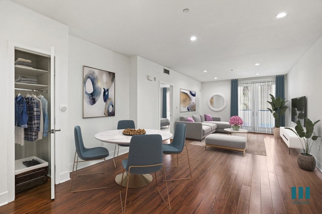 Dining and Living Room with Hall Closet, Vinyl Flooring, Recessed Lighting, and Balcony