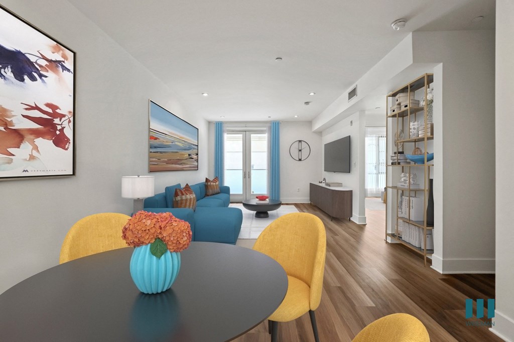 Open-Concept Dining and Living Room with Patio