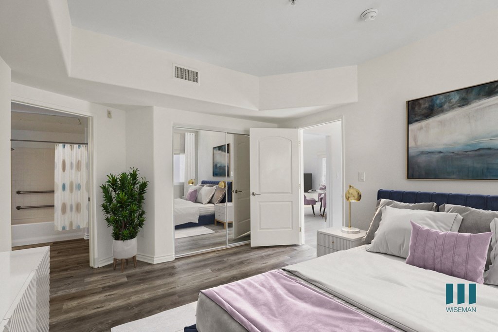 Bedroom with Mirrored Closet, Vinyl Flooring, and Bathroom