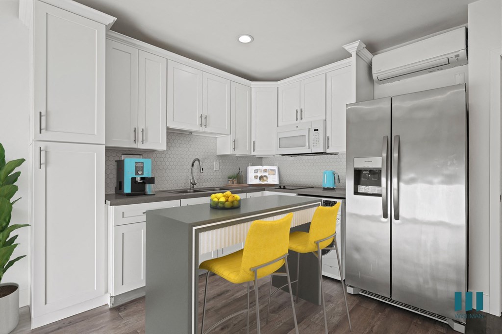 Open-Conept Kitchen with Stainless-Steel Appliances