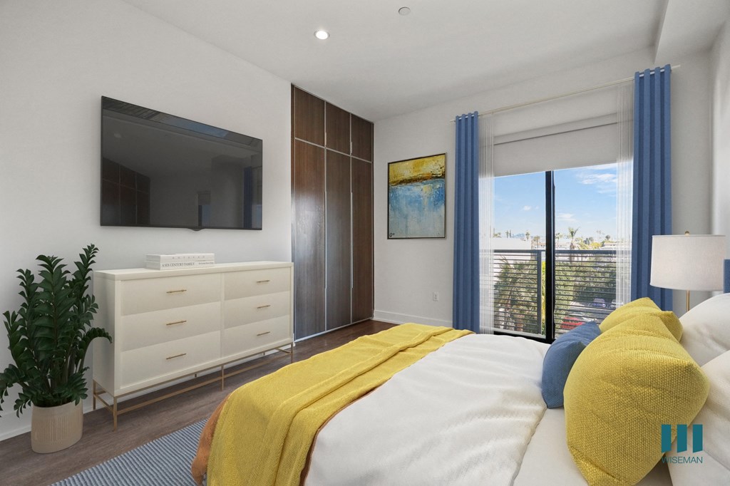 Bedroom with Built-In Cabinets, Vinyl Flooring, and Balcony