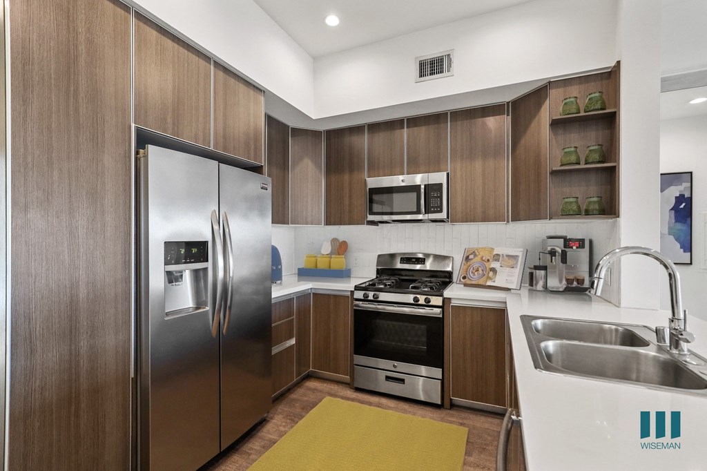 Kitchen with Energy-Efficient Appliances and Ample Cabinet Storage Kitchen with Energy-Efficient Appliances and Ample Cabinet Storage