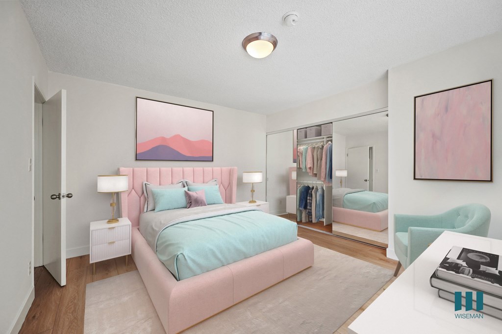 Bedroom with Mirrored Closet and Vinyl Flooring