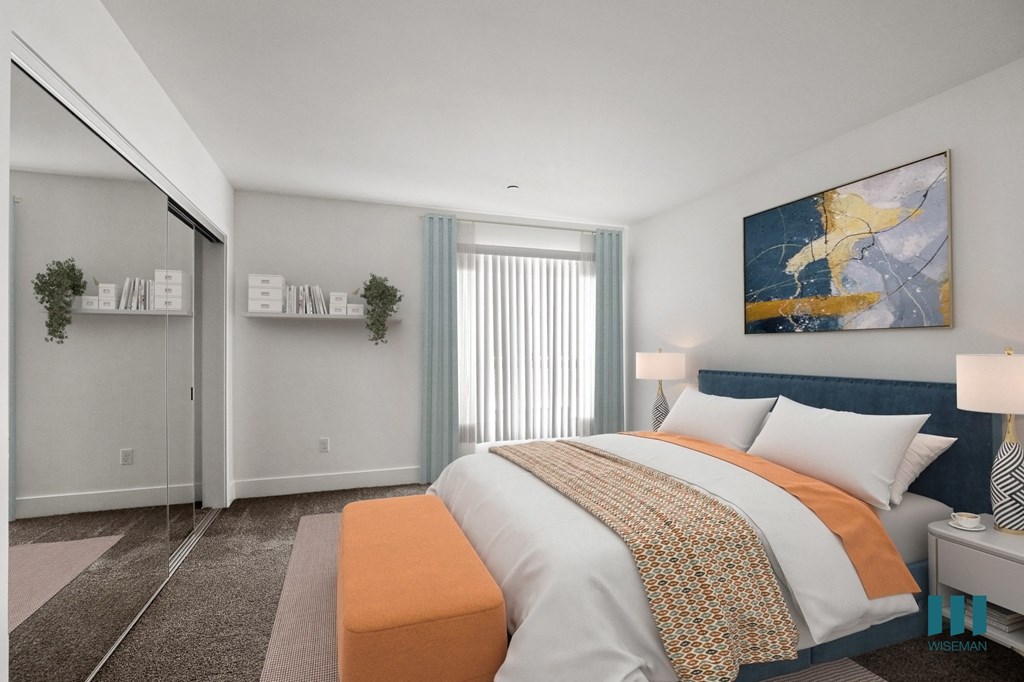 Bedroom with Mirrored Closet and Patio