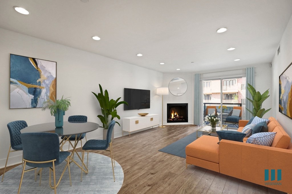 Dining and Living Room with Electric Fireplace and Patio