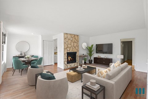 Open-Concept Dining and Living Room with Fireplace