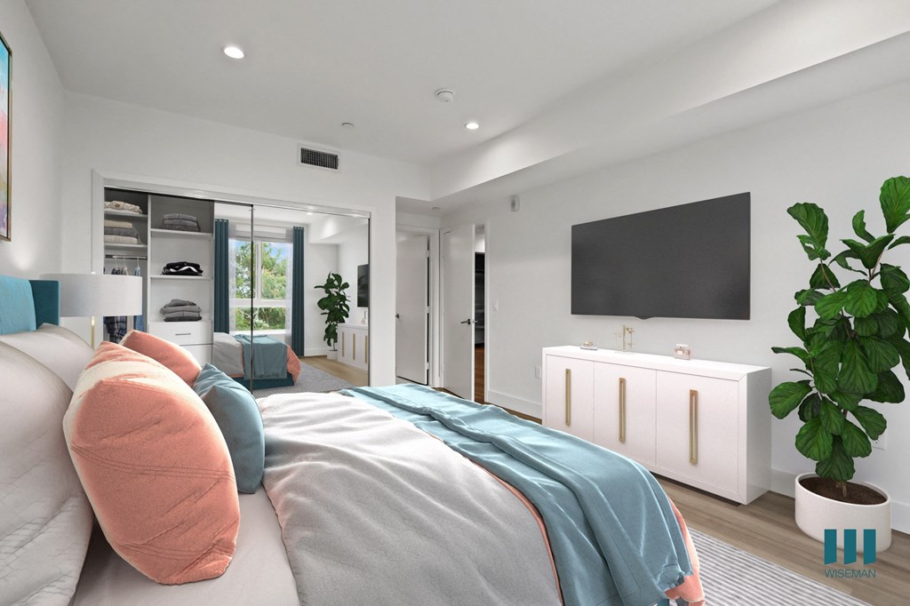 Bedroom with Mirrored Closet with Shelving, Vinyl Flooring, and Recessed Lighting