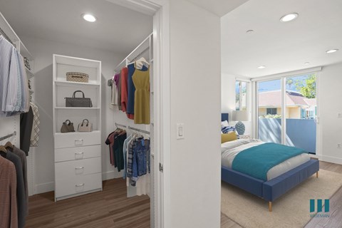 Bedroom with Walk-In Closet with Built-In Organizers, Vinyl Flooring, Recessed Lighting, and Patio