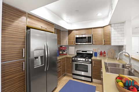 Kitchen with Stainless-Steel Refrigerator, Stove, Microwave Oven, Dishwasher