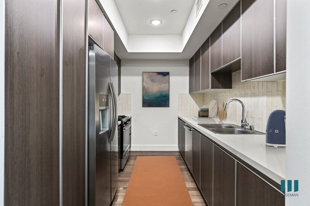 Kitchen with Energy-Efficient Appliances and Ample Cabinet Storage