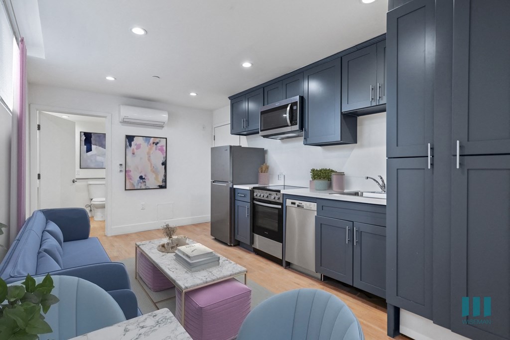 Studio Unit with Full-Kitchen , Bedroom, and Living Room Space