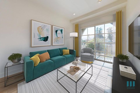 a living room with a green couch and a glass coffee table