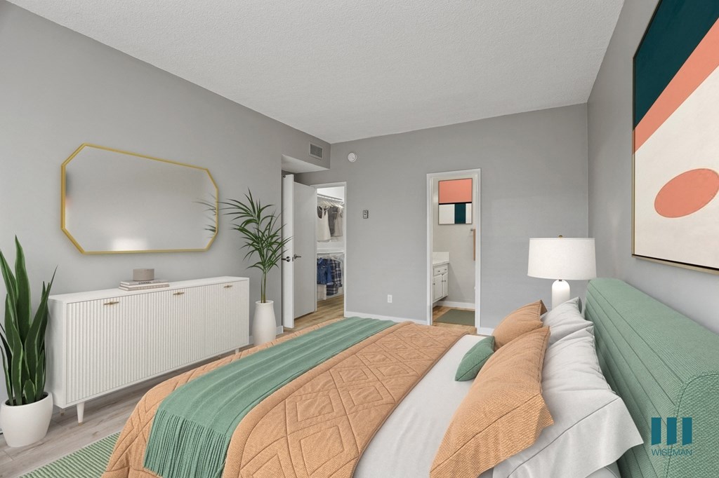 Bedroom with Walk-In Closet, Bathroom, and Vinyl Flooring