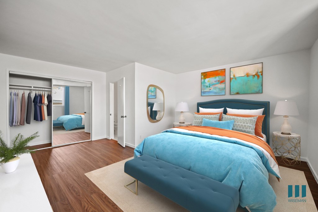 Bedroom with Mirrored Closet and Vinyl Flooring