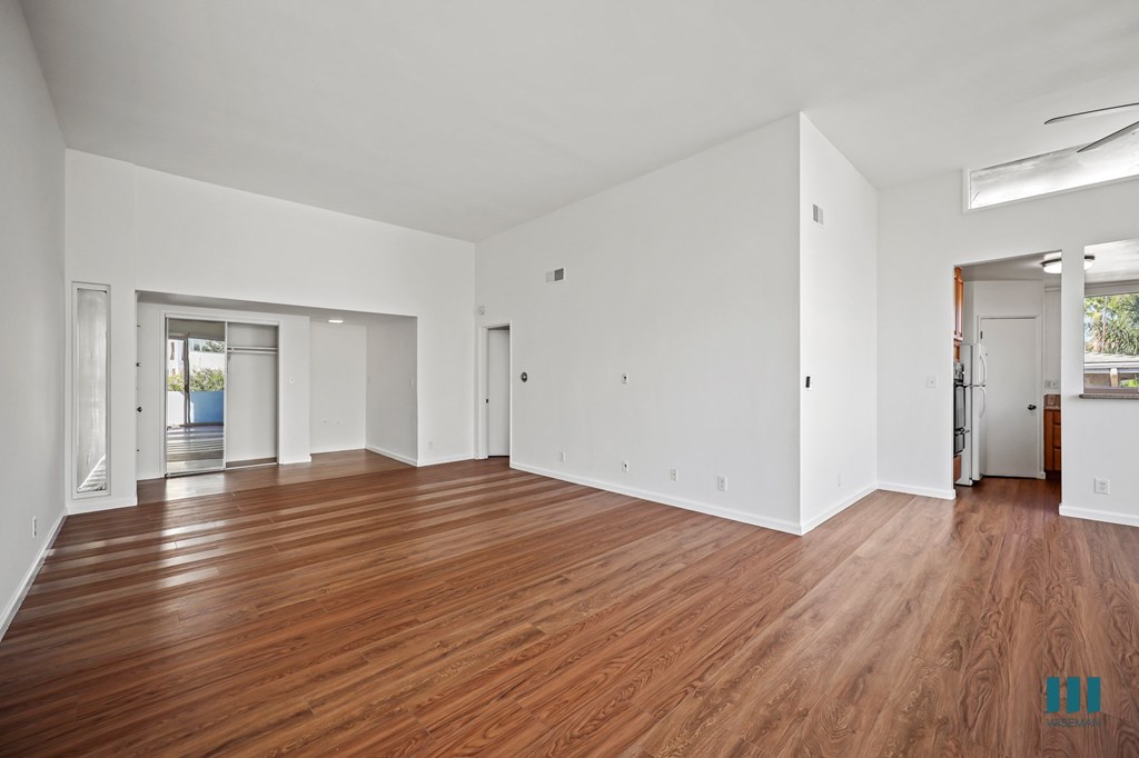 Front Entryway with a Hall Closet and Living Room