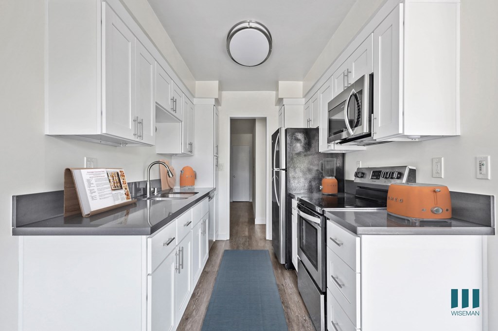 Kitchen with Stainless-Steel Refrigerator, Stove, Microwave Oven, and Dishwasher