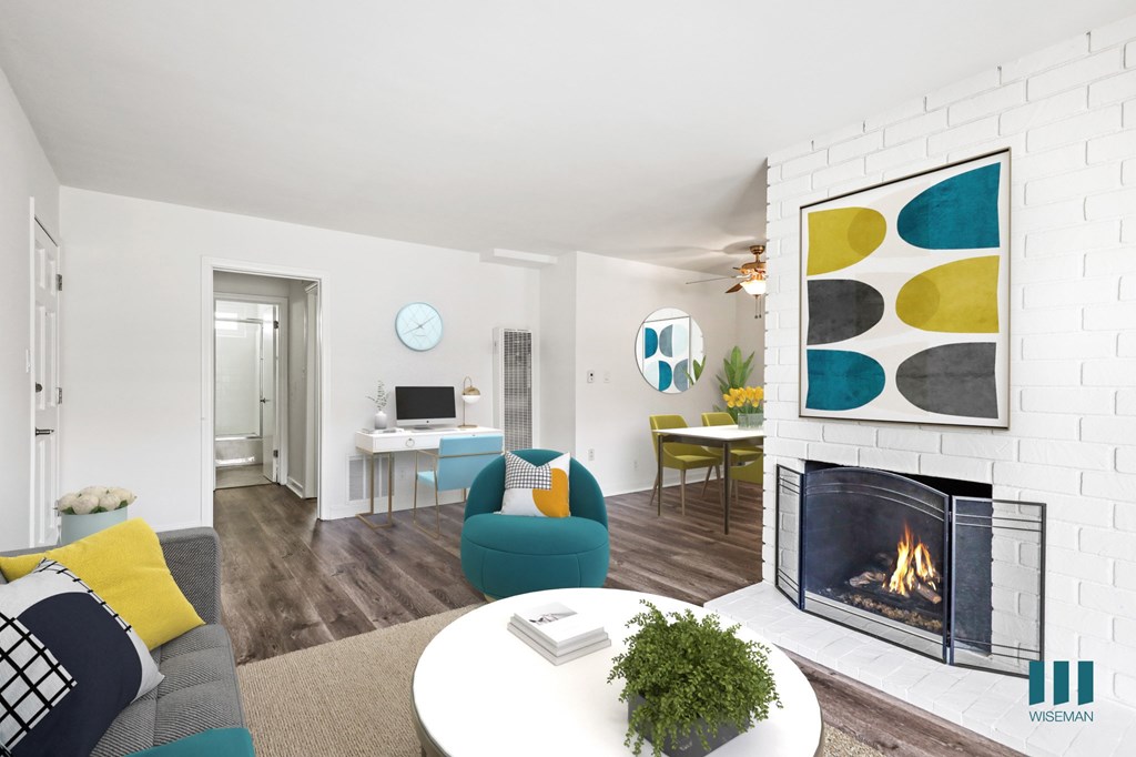 A living room with a fireplace and a couch.