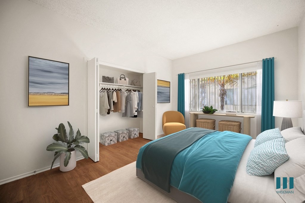 a bedroom with a bed and a closet