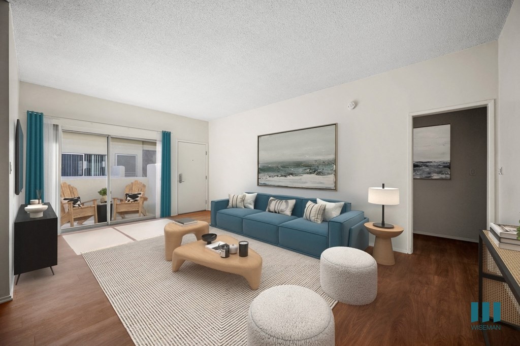 a living room with a blue couch