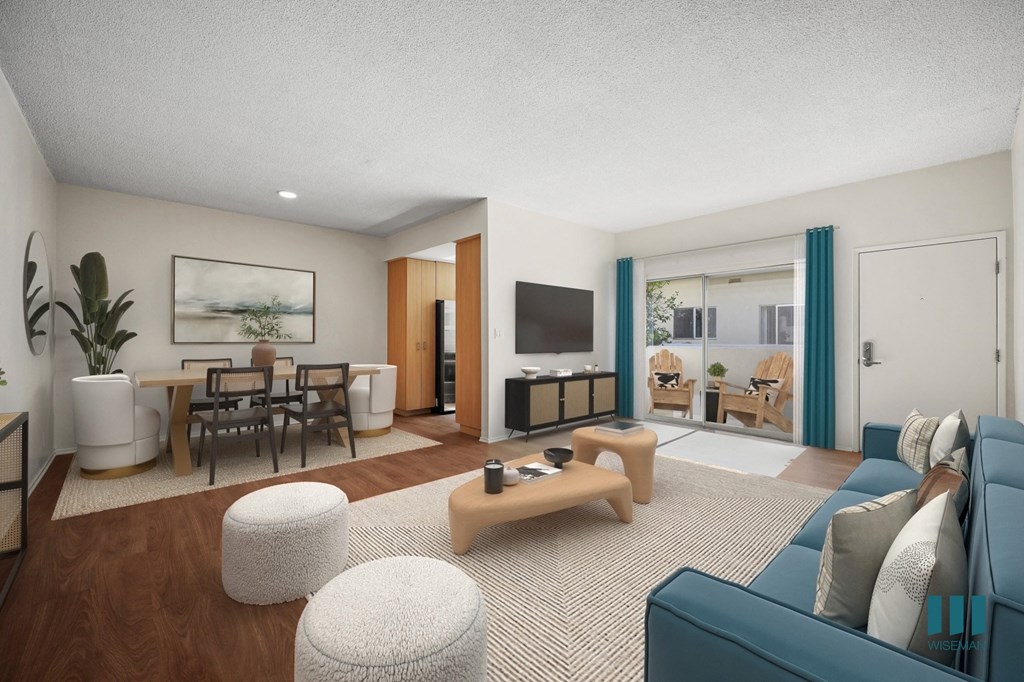 a living room with a couch and a table and a television