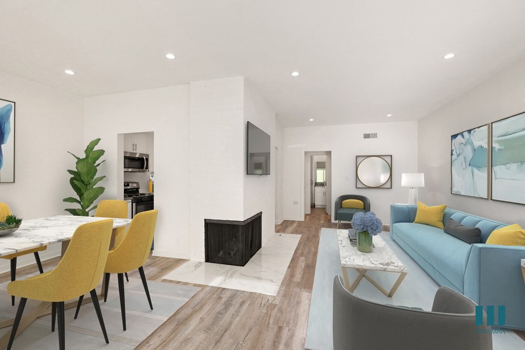 Dining and Living Room with Electric Fireplace, Vinyl Flooring, and Recessed Lighting