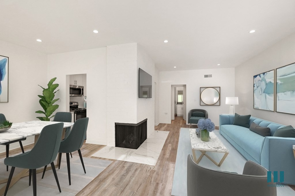 Dining and Living Room with Electric Fireplace, Vinyl Flooring, and Recessed Lighting