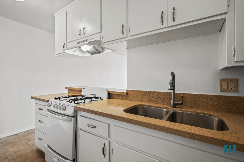 Kitchen with Stove Oven and Ample Cabinet Storage