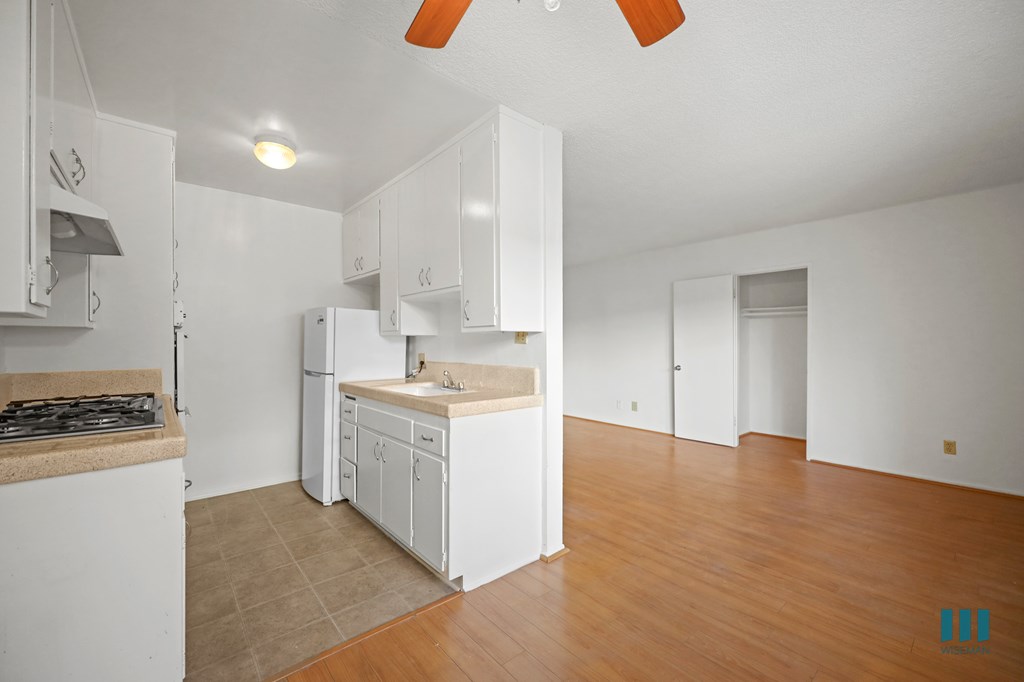 Kitchen with Refrigerator, Range Stove, and Oven
