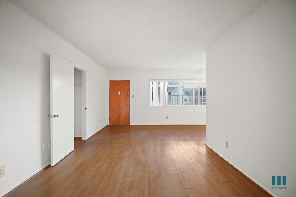 Entryway, Living, and Dining Room with Windows