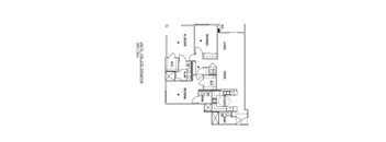 A floor plan of a house with a kitchen, living room, and two bathrooms.