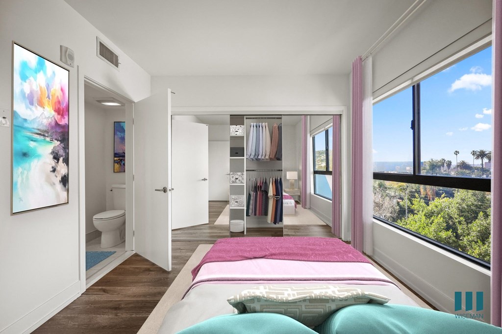 Bedroom with Vinyl Flooring, Mirrored Closet, and Large-Size Windows