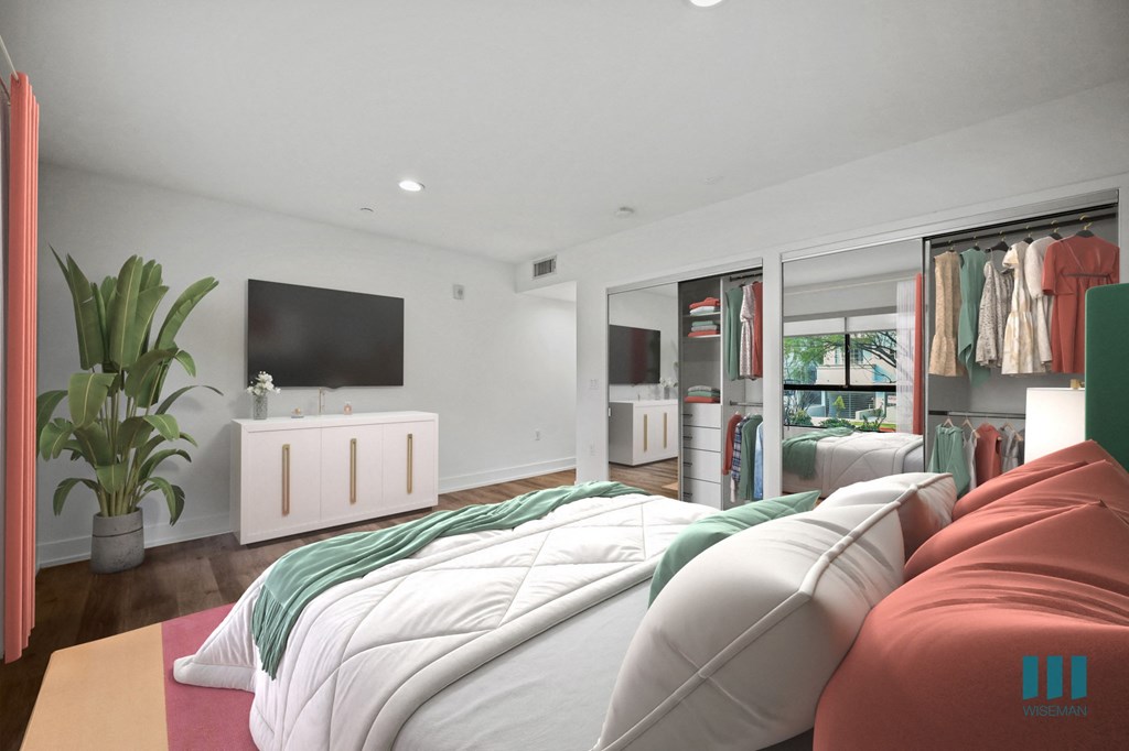 Spacious Bedroom with Closets with Built-In Organizers, Recessed Lighting, and Vinyl Flooring