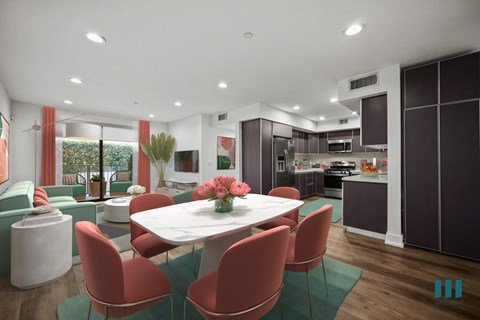A modern kitchen with a dining table set for four.