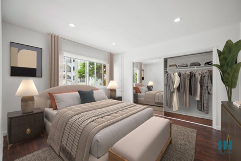 Bedroom with a Mirrored Closet and Natural Light