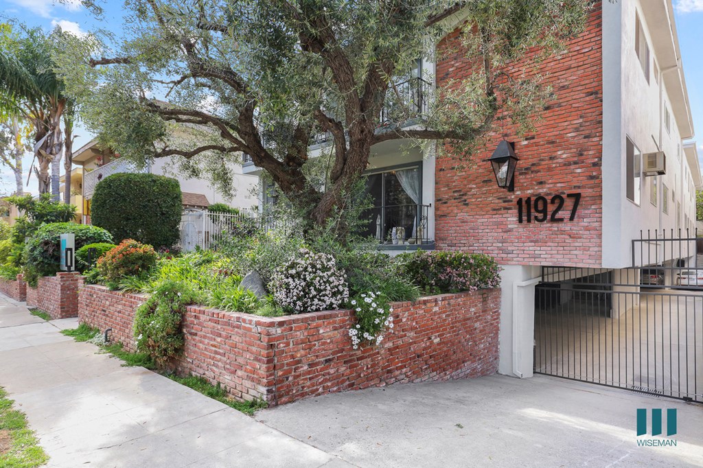 Sidewalk View and Parking Entrance of Kiowa Olive