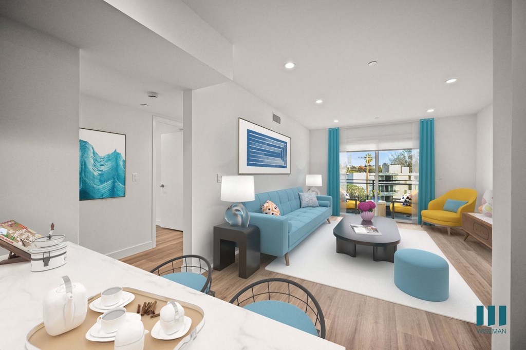 A modern living room with a dining table set for breakfast.