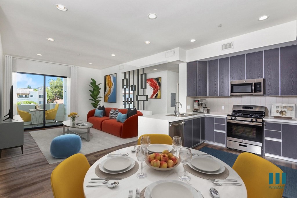 Open-Concept Kitchen, Dining, and Living Room with Patio