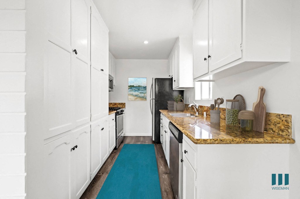 Kitchen with Stainless-Steel Refrigerator, Stove, Microwave Oven, and Dishwasher